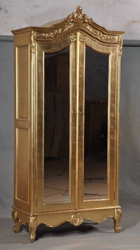 White armoire with mirrored door