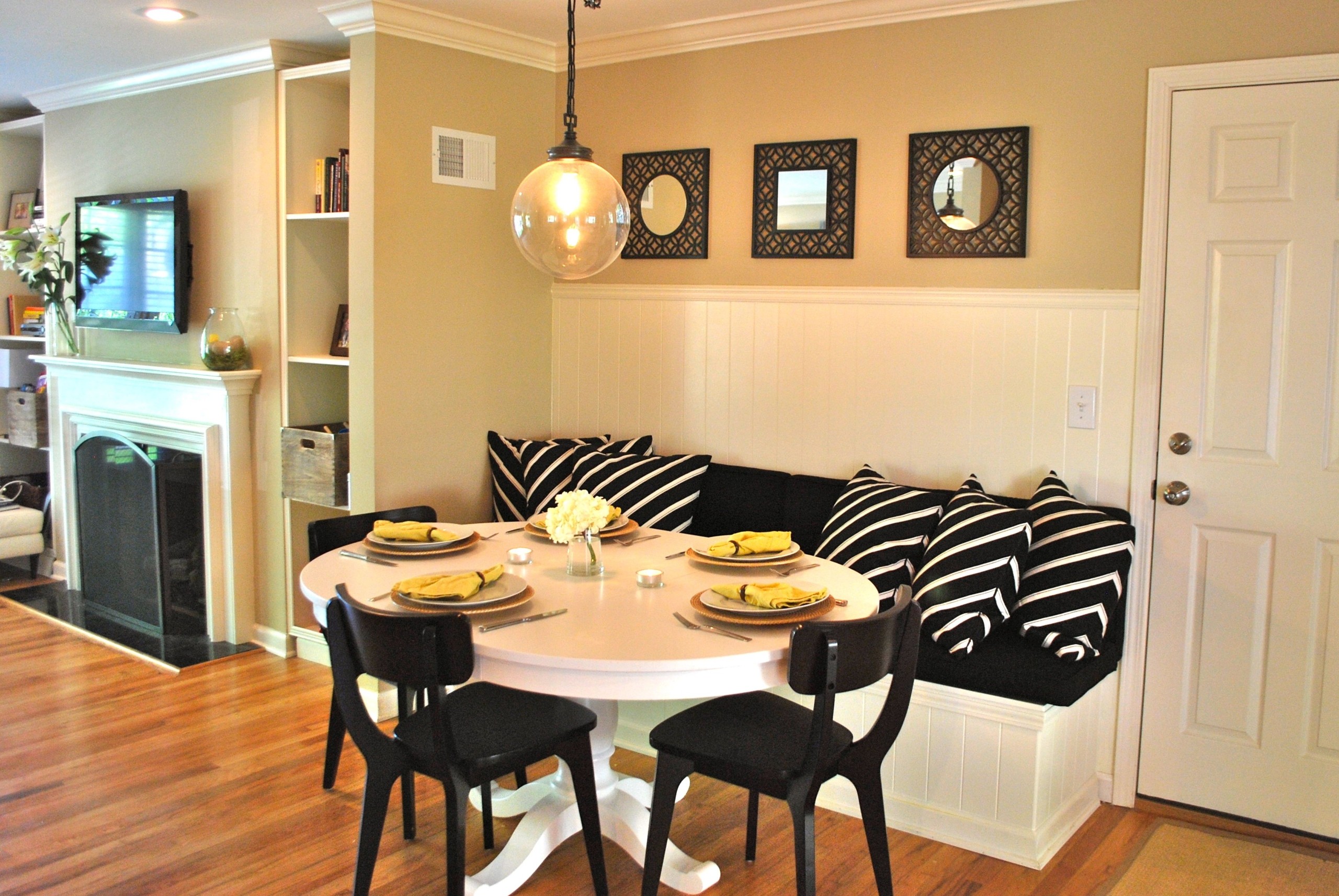 Table also double black armless dining chairs as well as