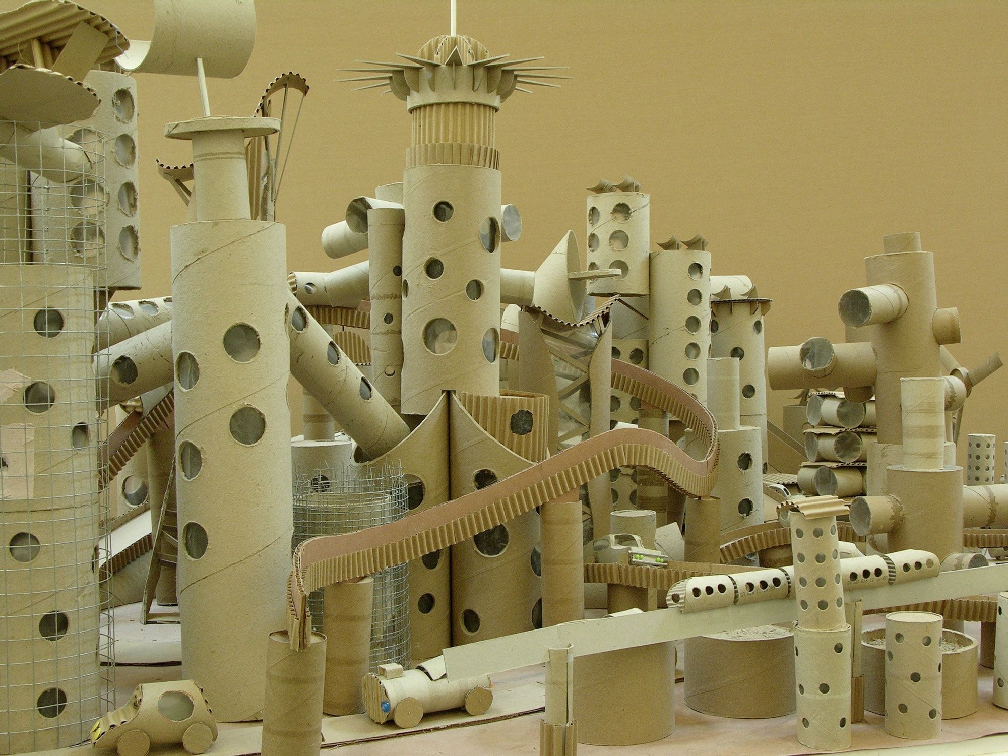 Cardboard tube cityscape by michael gondry