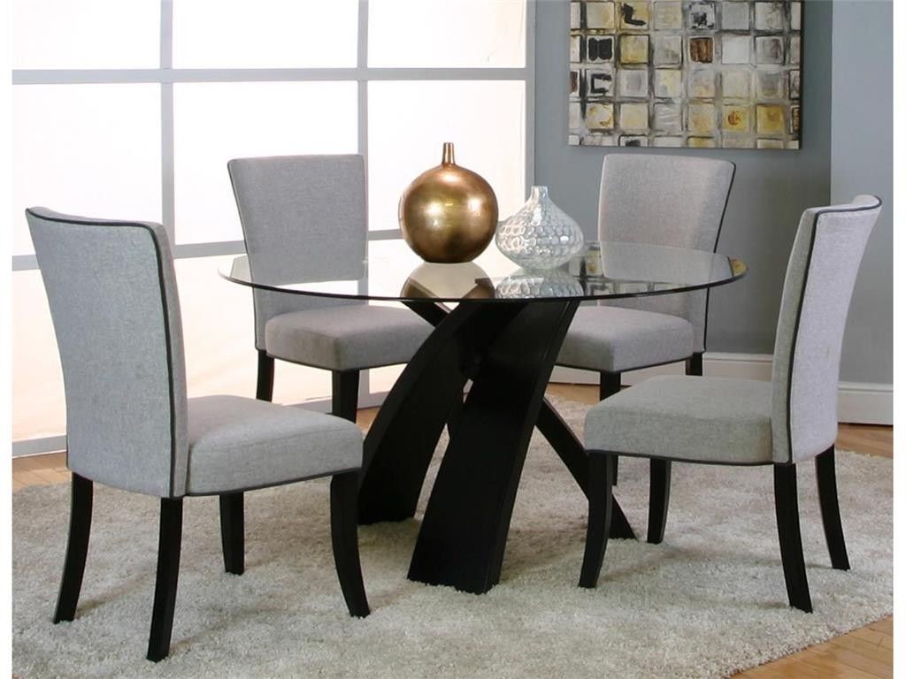 Driftwood dining tables with glass tops