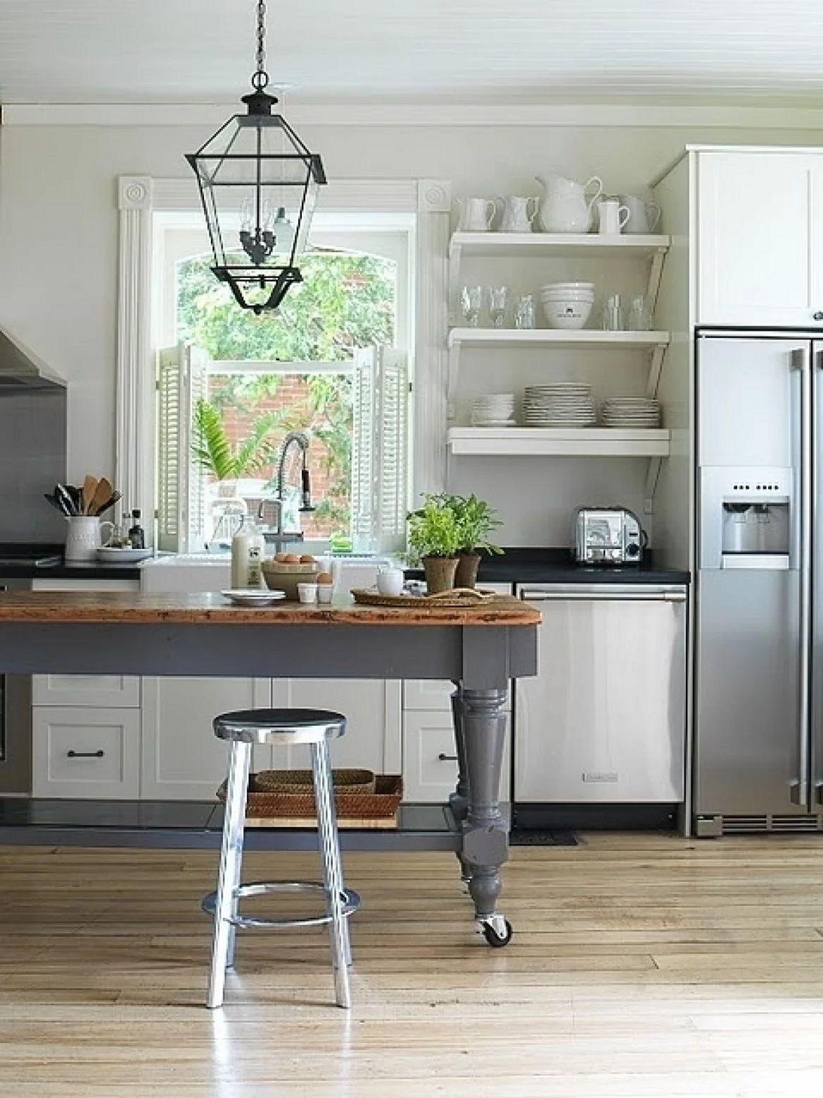 I love the rustic utilitarian feel of the farmhouse kitchen