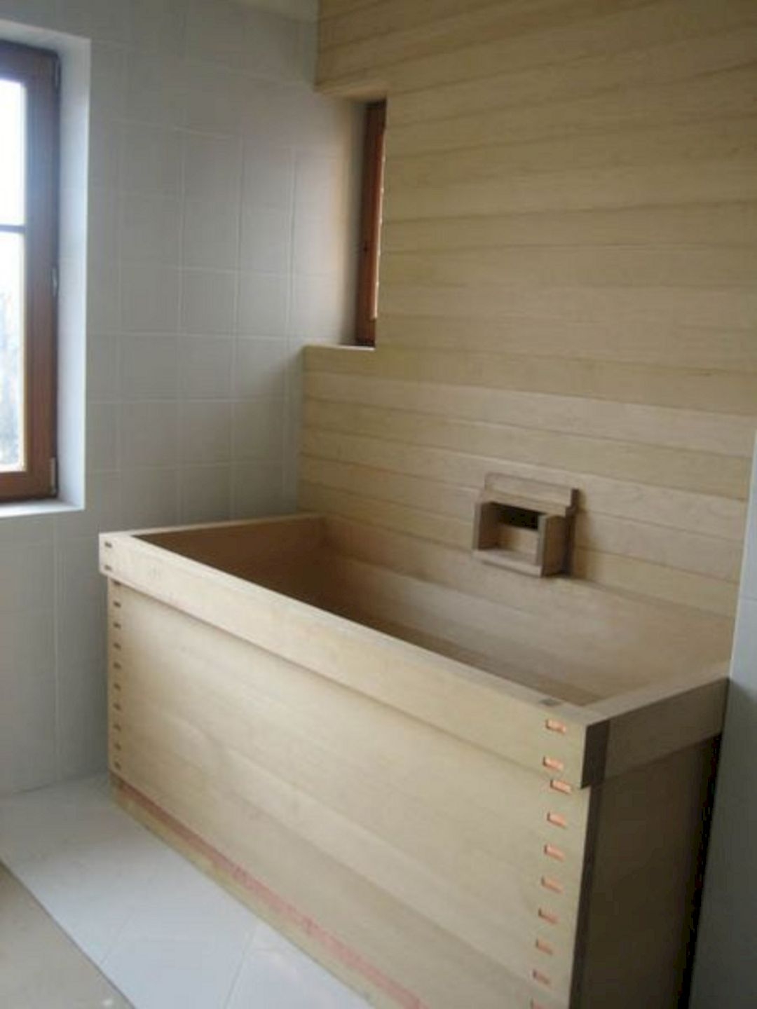 Pictured above a beautiful custom wooden ofuro designed built by
