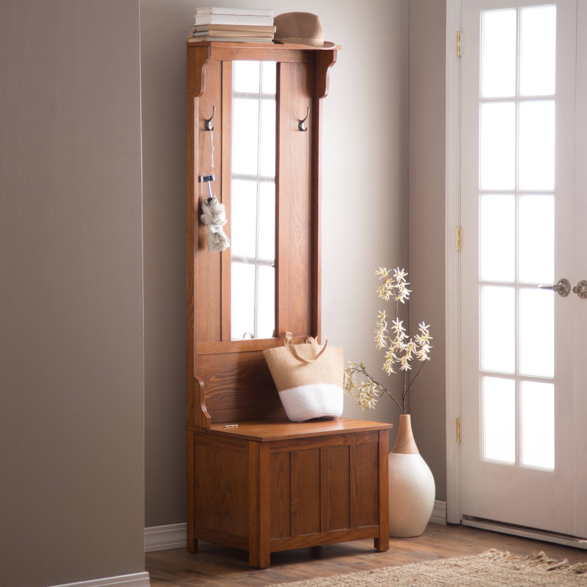 Wooden Entryway Tall Hall Tree Bench Coat and Hat Rack with Mirror in Oak Finish. With 2 Double Hooks in Antique Bronze, Storage Bench Base and a Full Length Central Mirror.