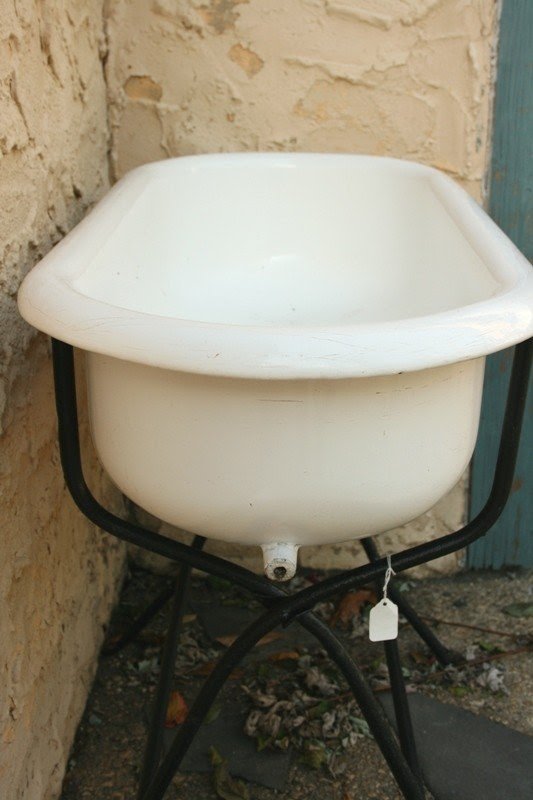 Vintage baby tub with iron stand