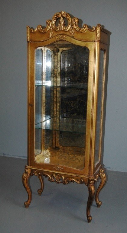 Gold curio cabinets 1