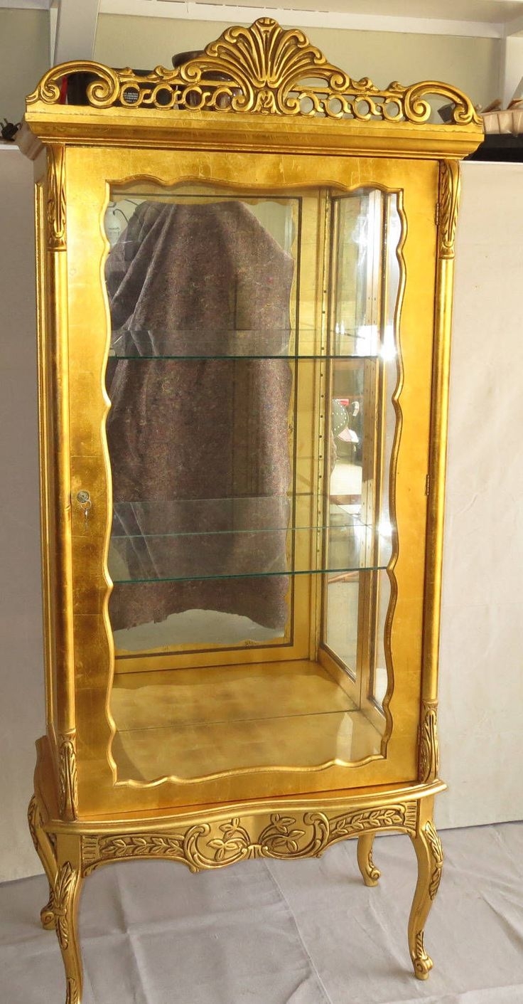 Gold curio cabinets 3