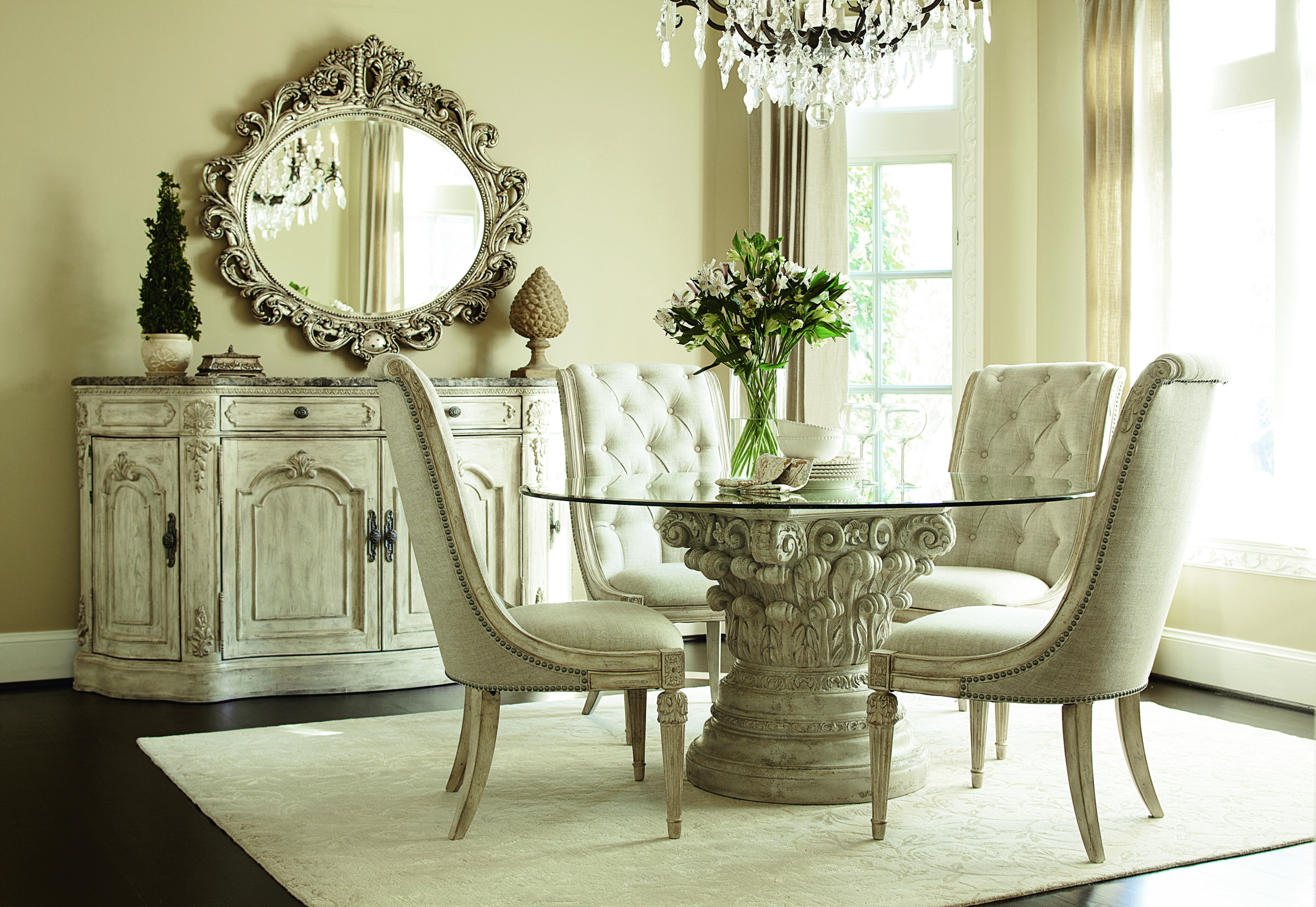 Round glass pedestal table
