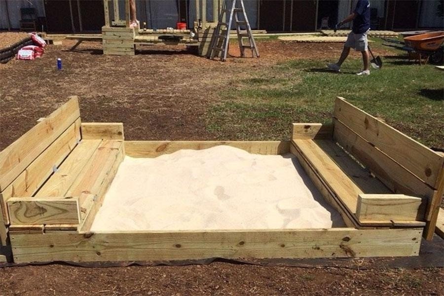 DIY sandbox with folding lid and seats