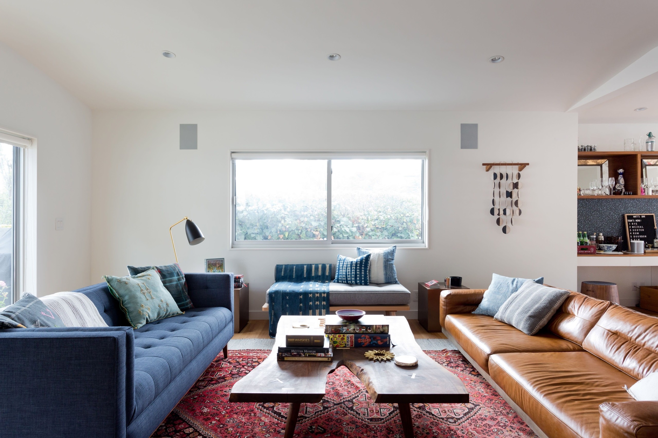 Eclectic Navy Blue and Brown Living Room