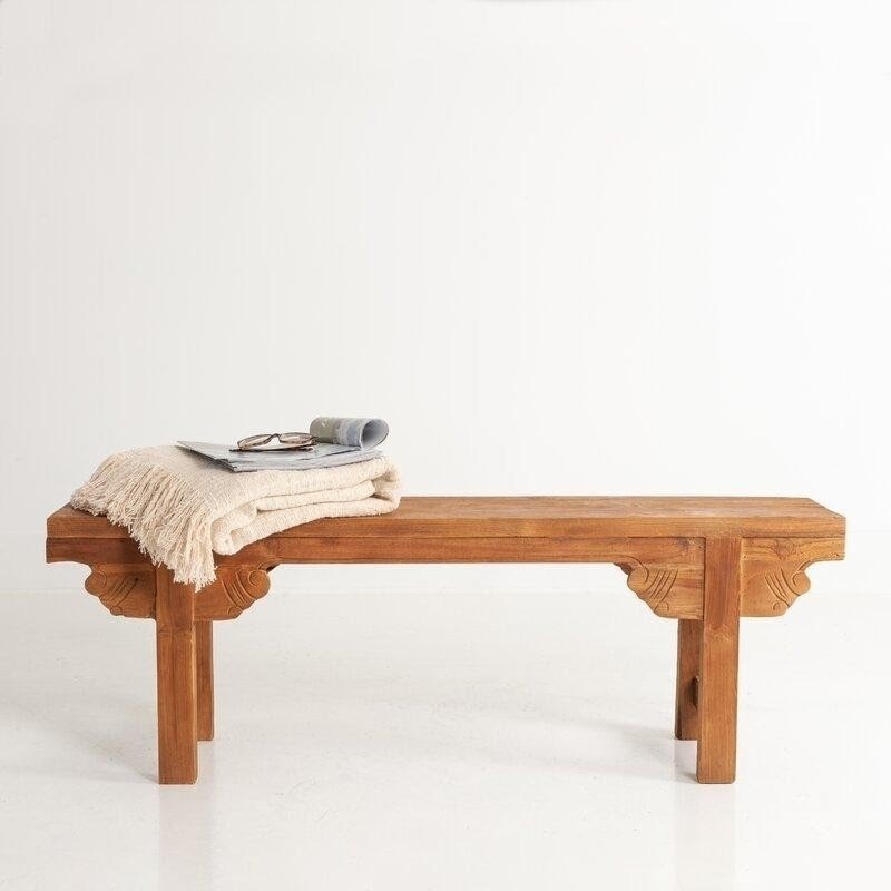 Wood dining bench with ornate design