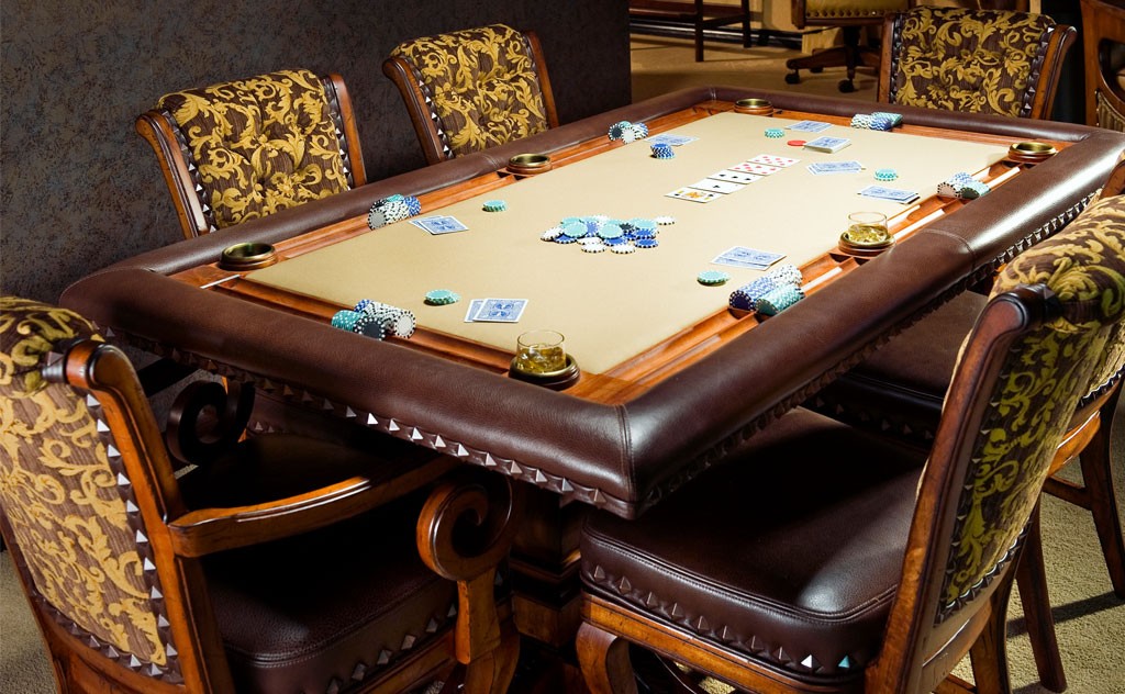 Luxury leather poker table with ornate chairs