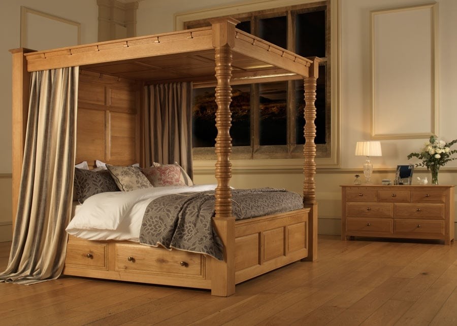 Classic wooden four poster bed with underbed storage