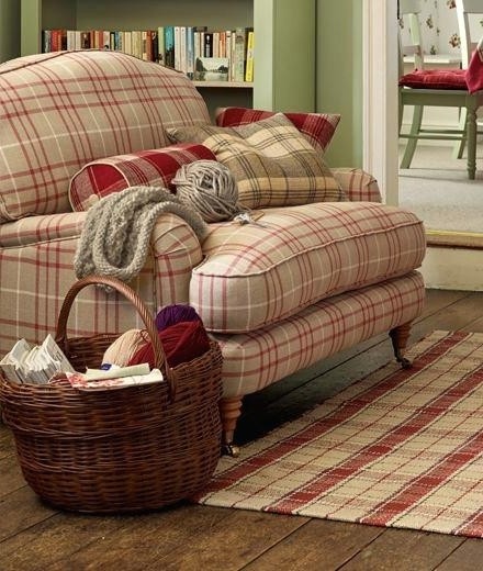 Cozy plaid sofa and chair in country cottage style