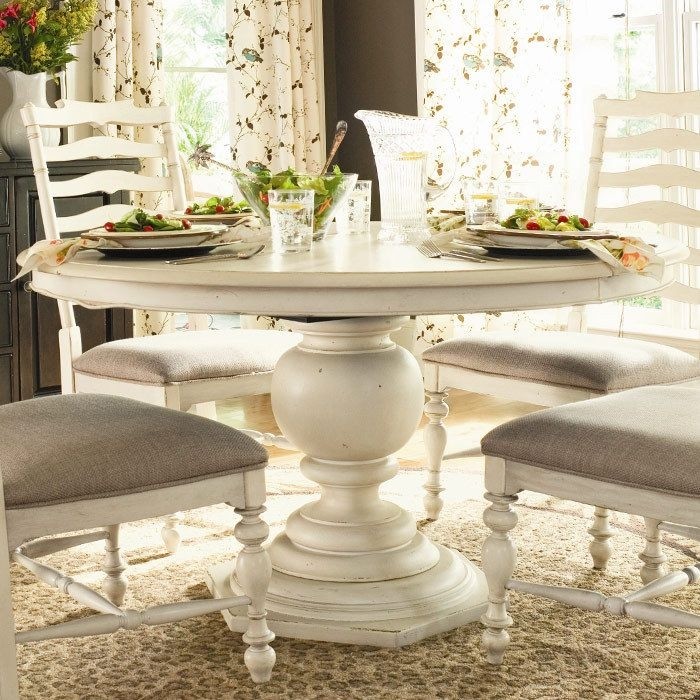 Love this table style and chairs round pedestal dining