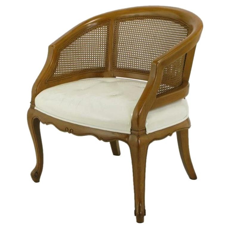 French regency walnut and white leather cane back chair