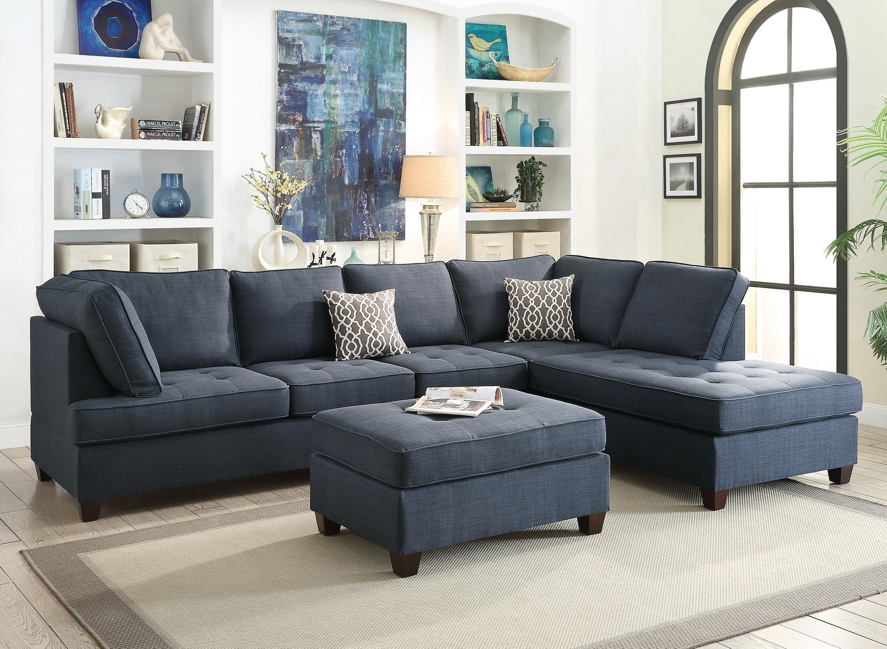 Modern dark blue sectional sofa with ottoman