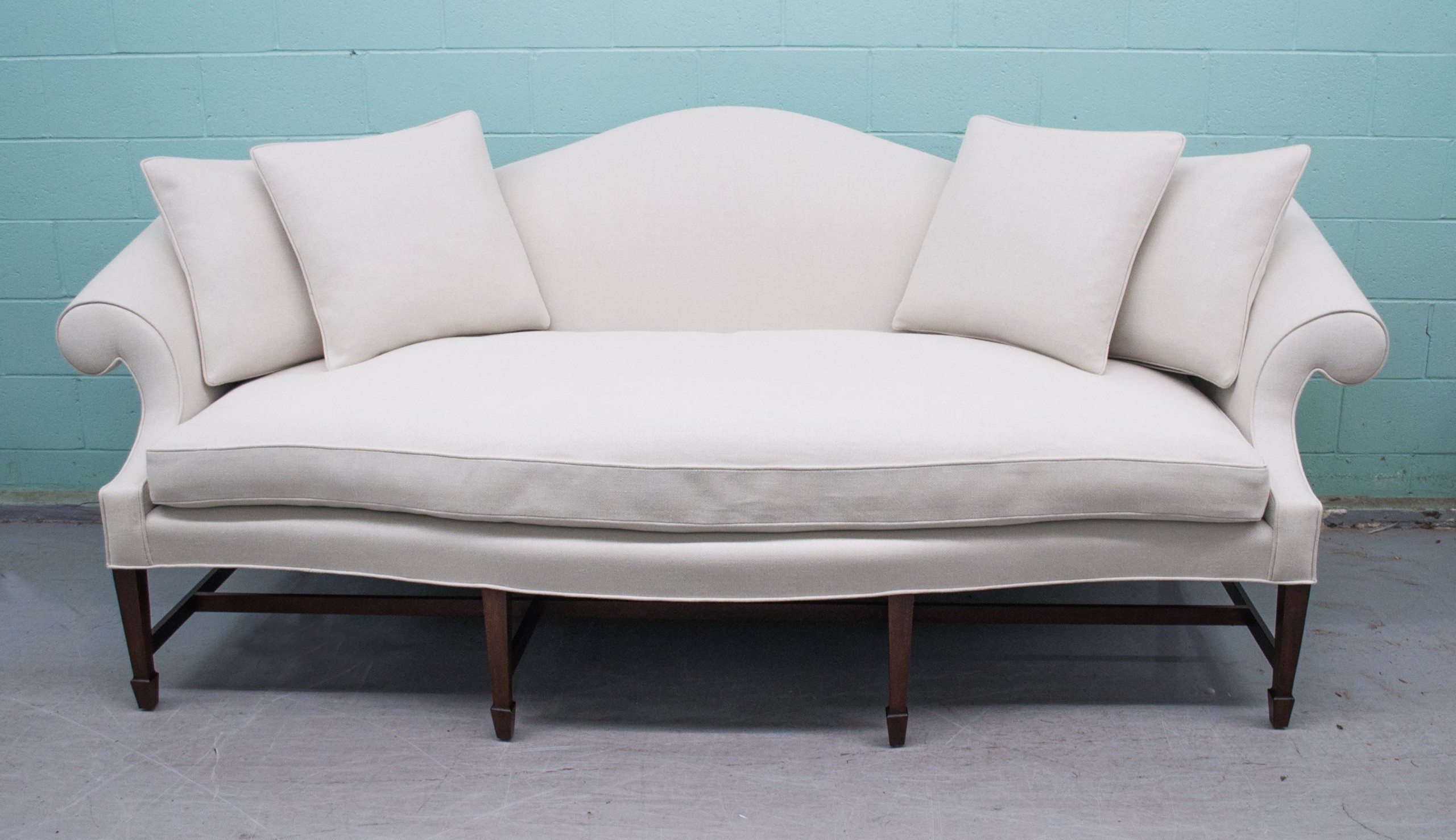 Elegant neutral tone handmade camelback sofa