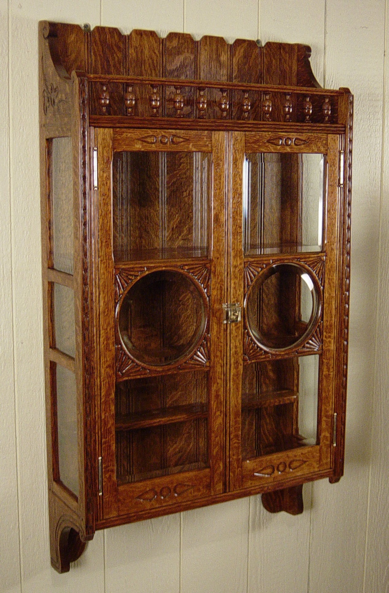 Hanging curio cabinet 7