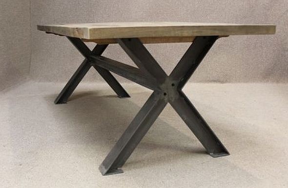 Metal base table a sturdy industrial style table with an