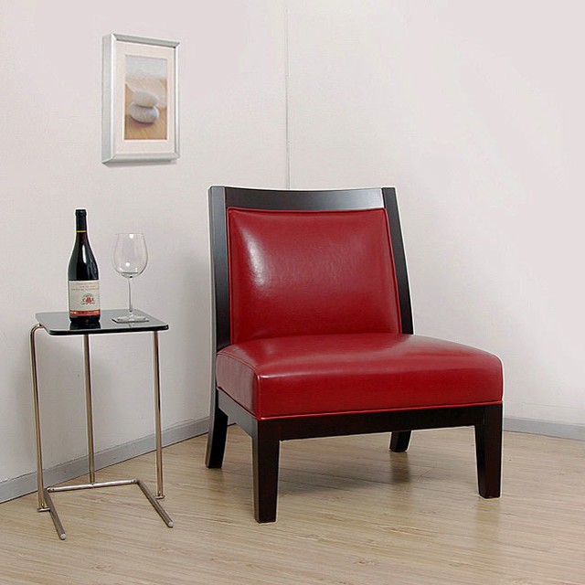 Burnt red leather accent chair with dark wood frame