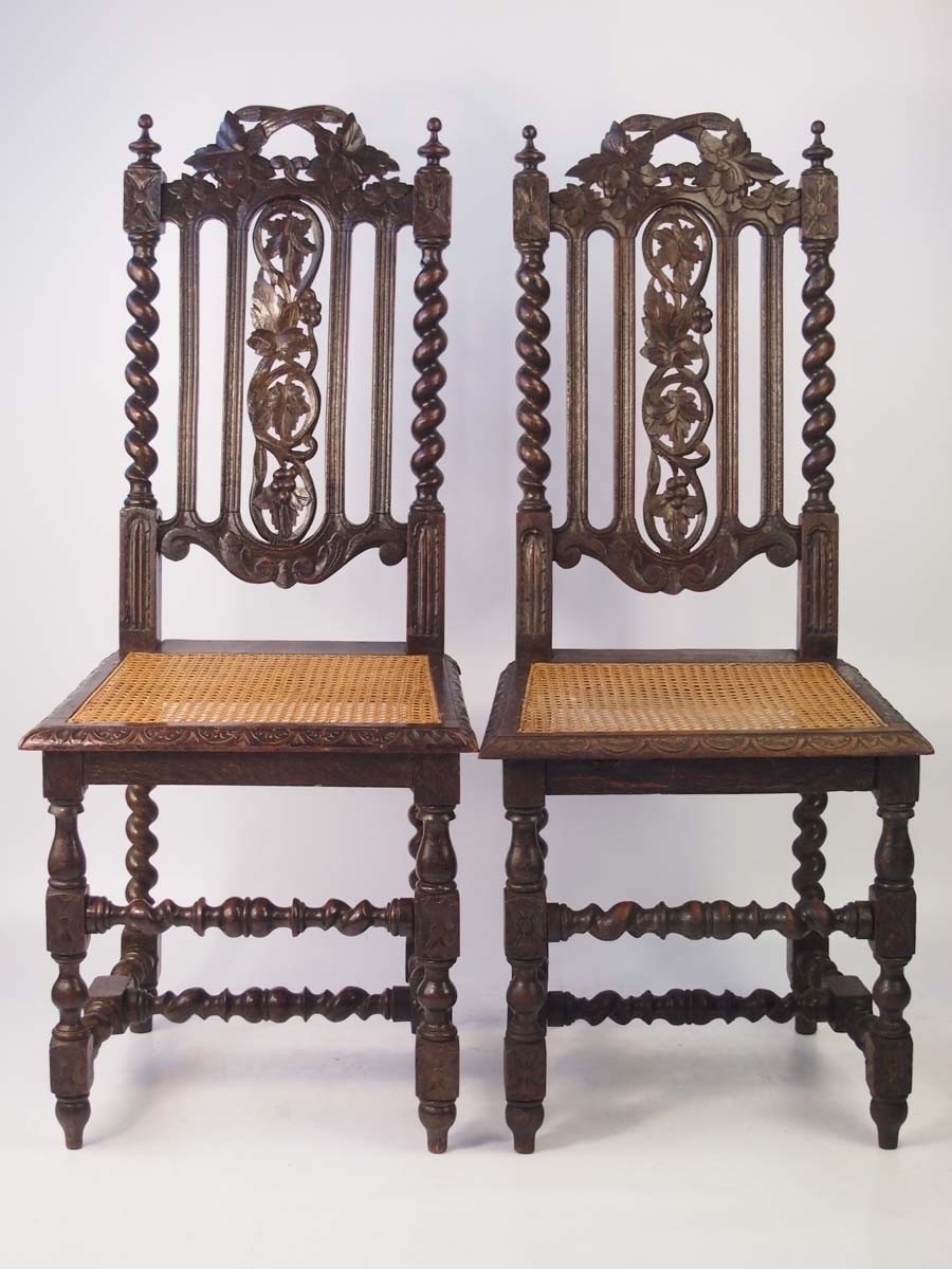Pair victorian gothic revival oak carved chairs
