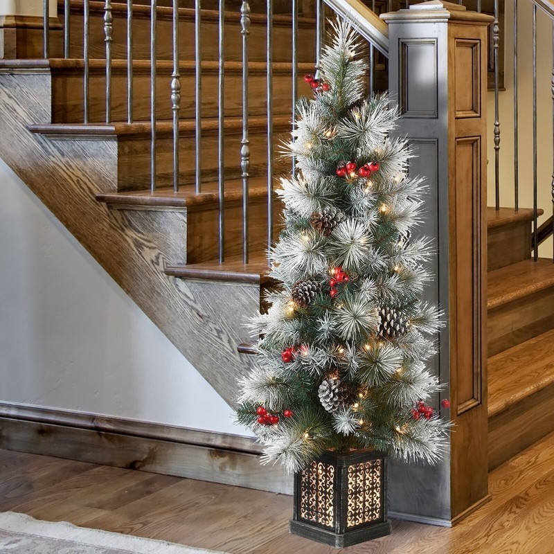 A Christmas tree with a unique base