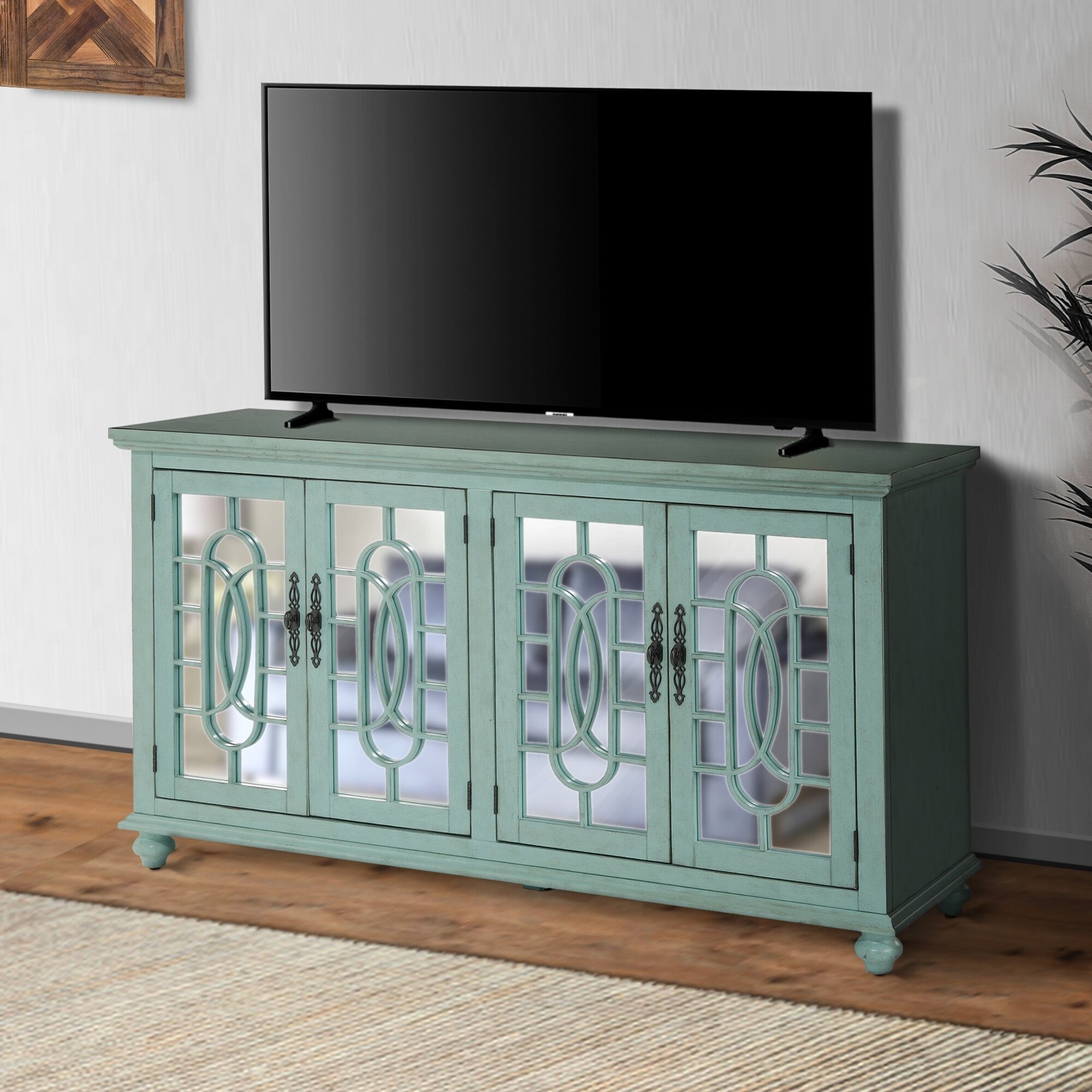A pale green glass front display cabinet