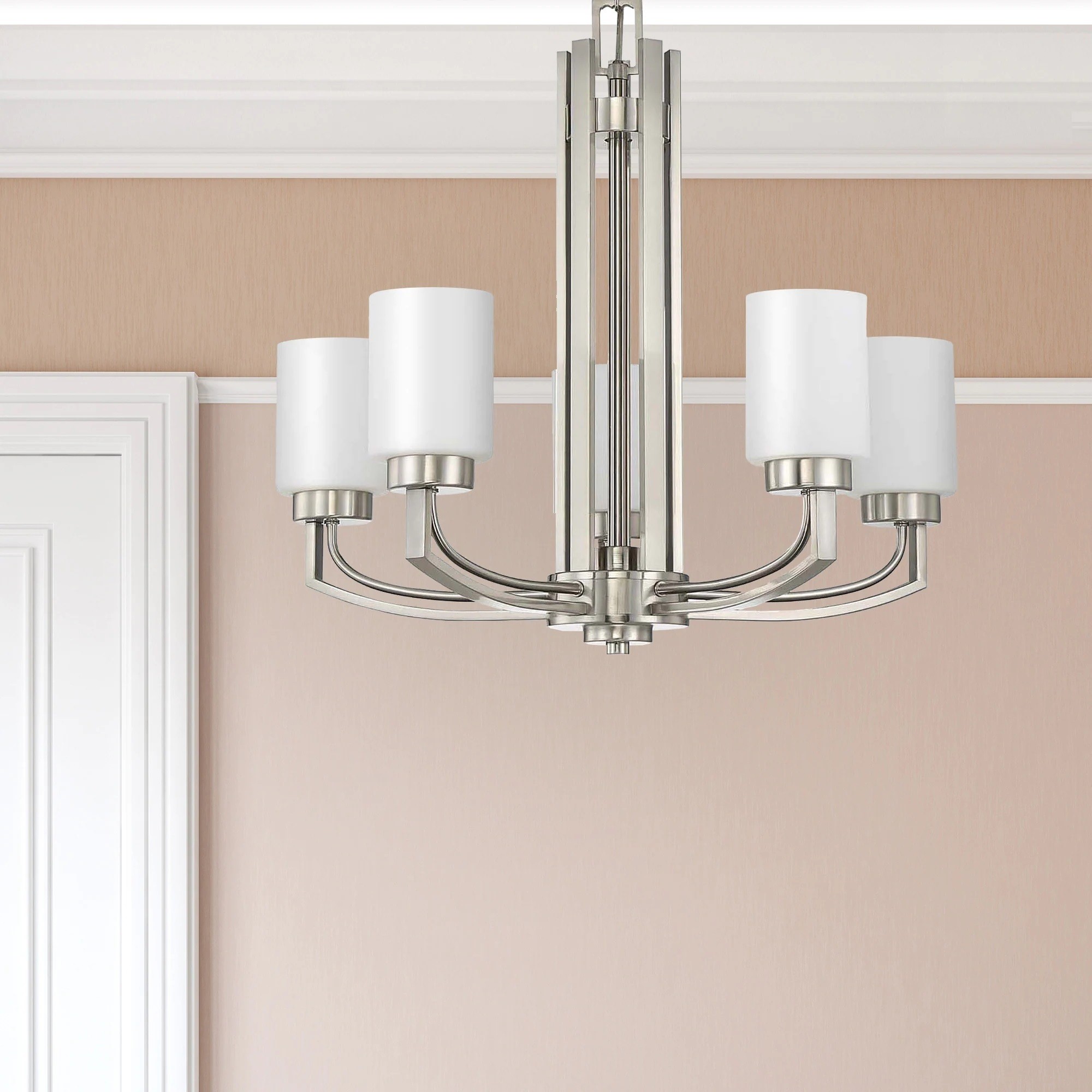A sleek stainless retractable ceiling light fixture