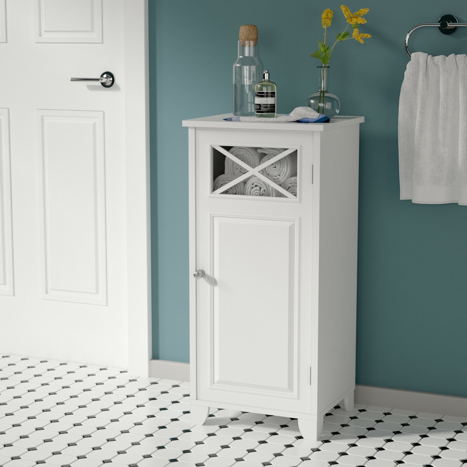 A small half size glass front storage cabinet