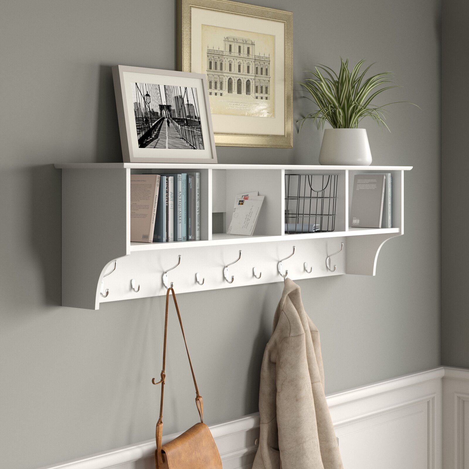 A wall mounted mini hallway coat storage cupboard