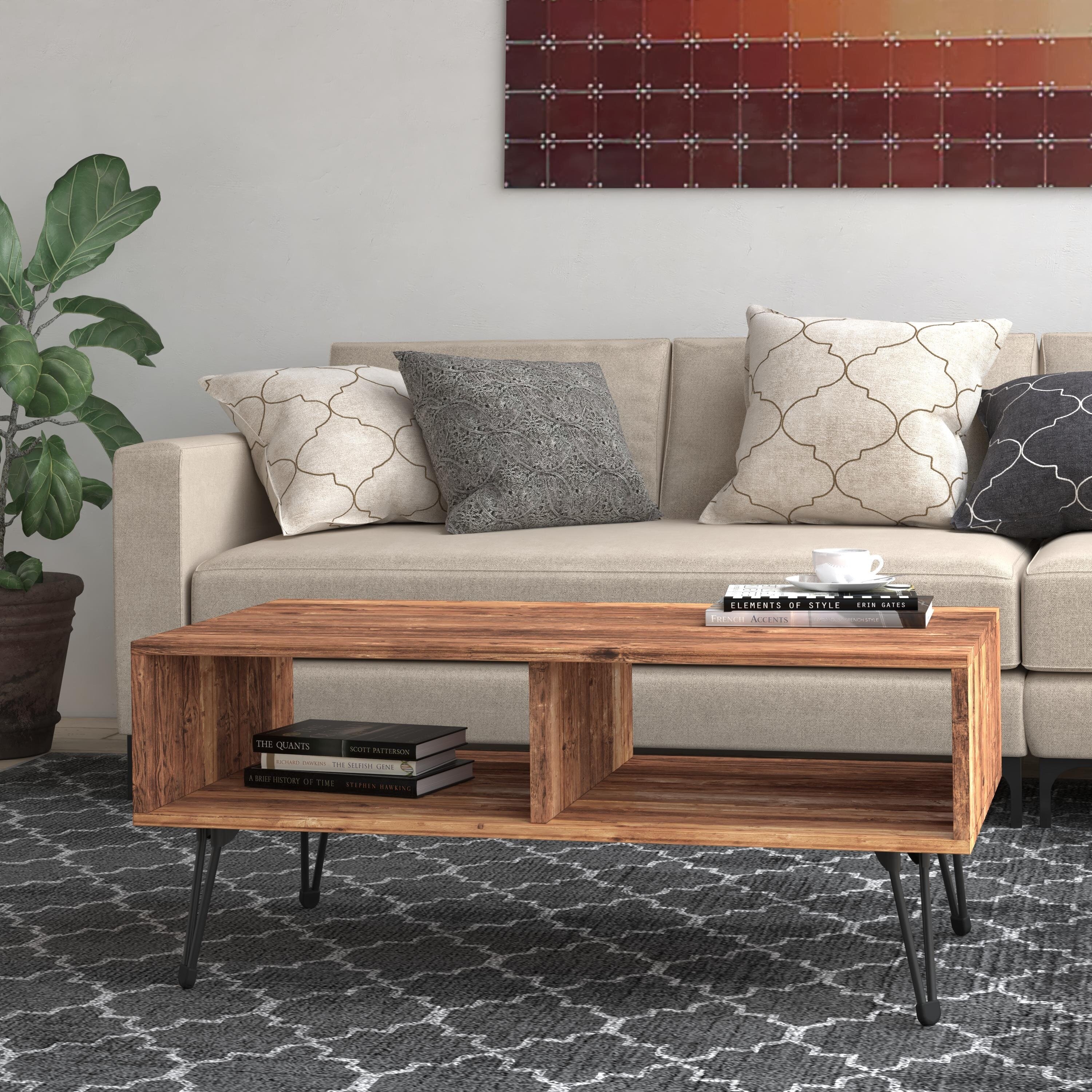An open frame wooden table with metal legs