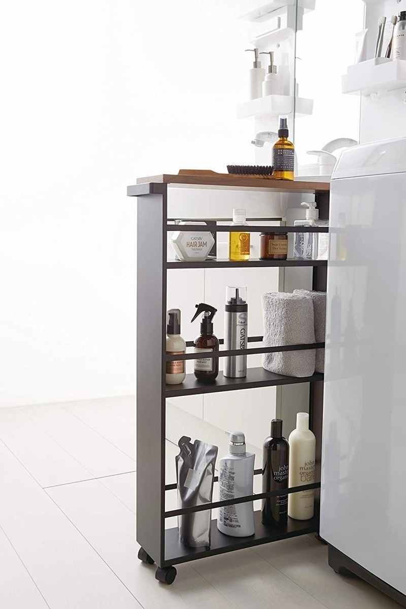 Narrow cabinet next to stove