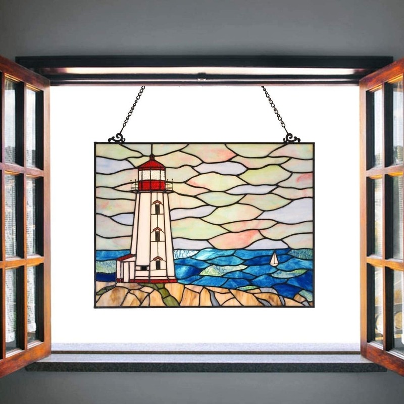 Stained glass window panels depicting a peaceful scenery 