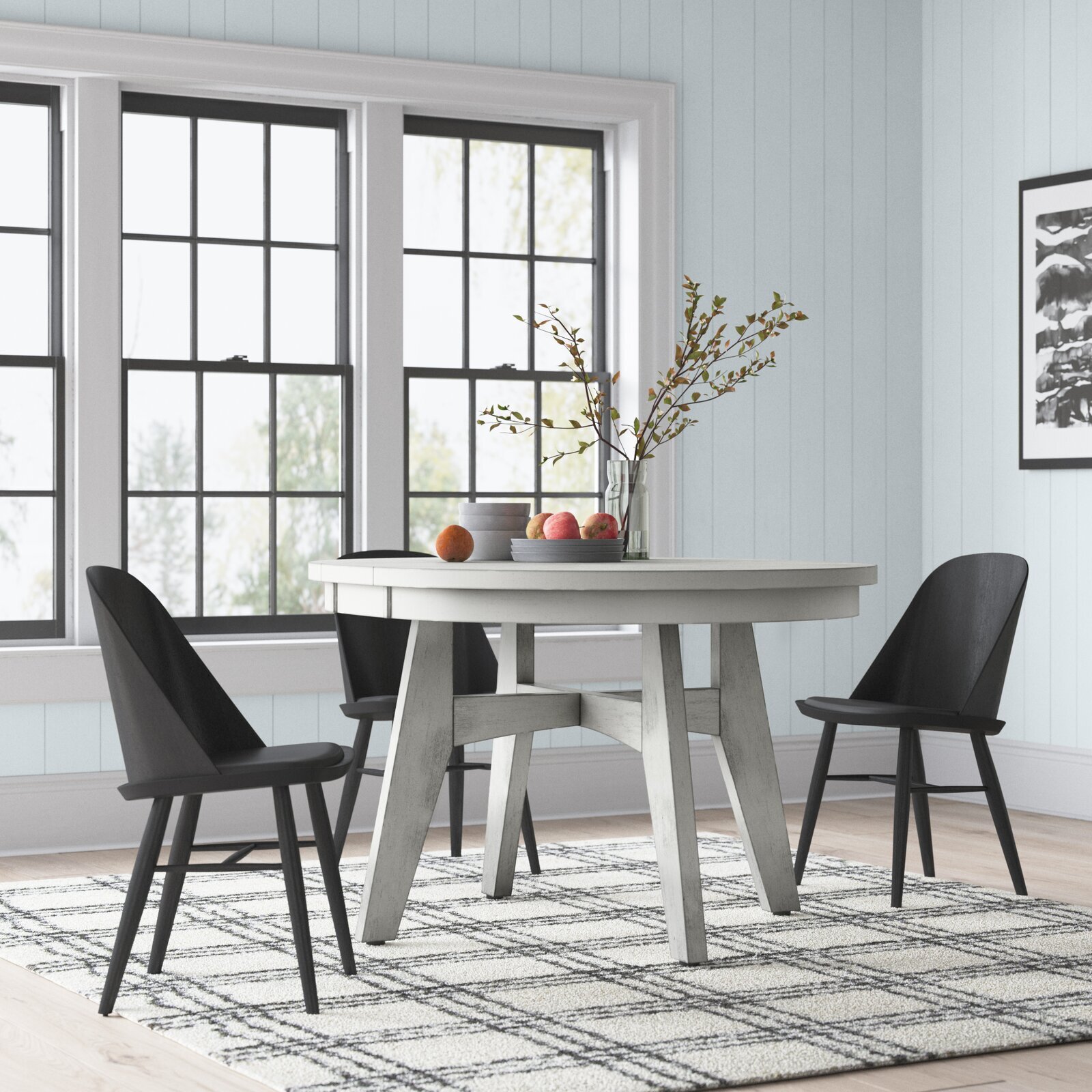 The circular hidden leaf dining table