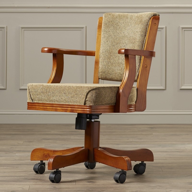 Upholstered, wooden dining chairs on rollers
