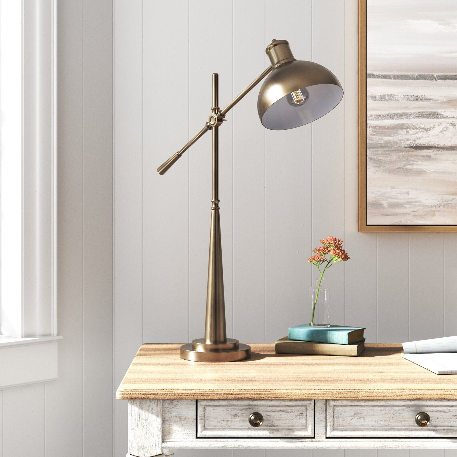 Adjustable brass desk lamp in a glossy varnish