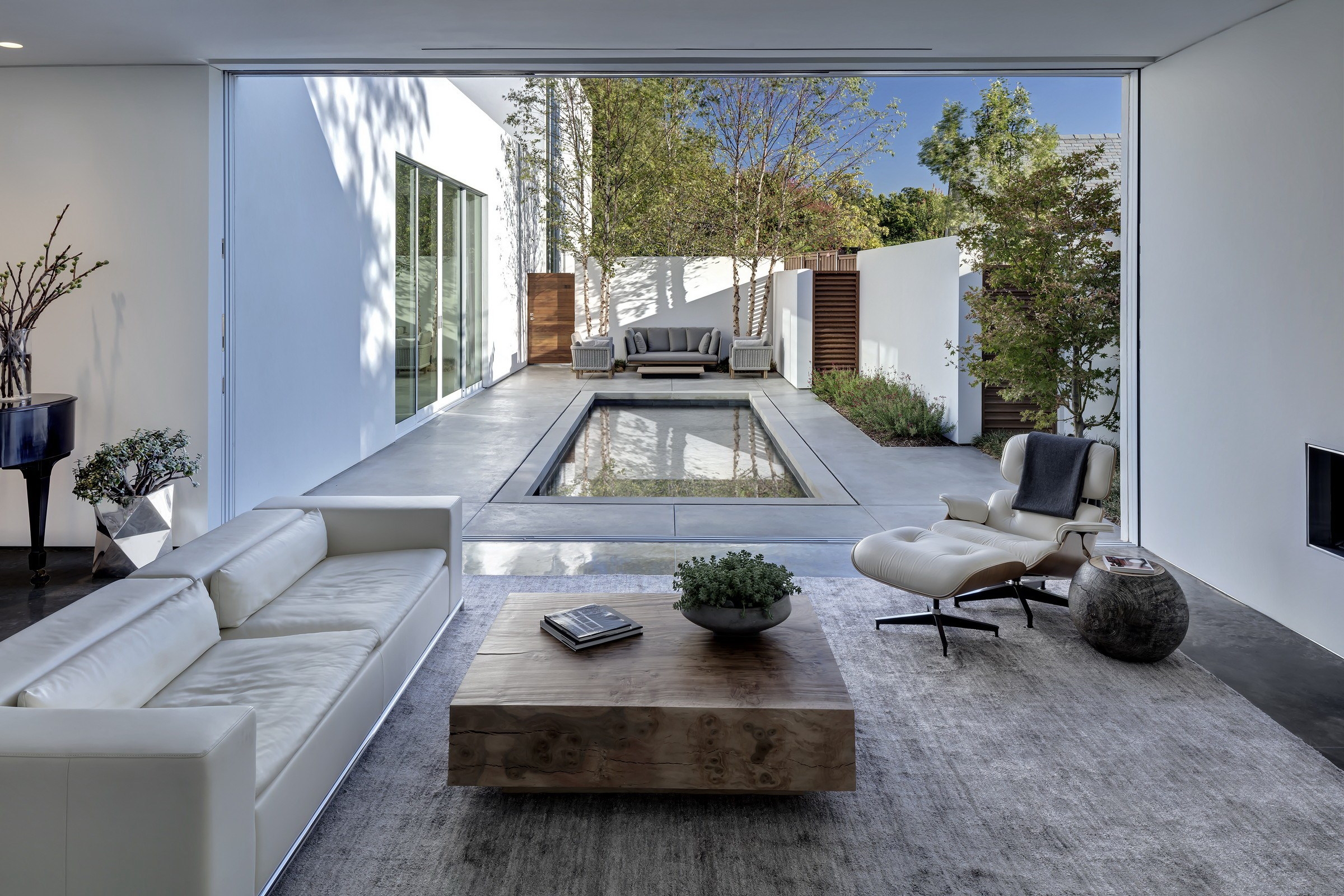Contemporary pool area in a neutral palette