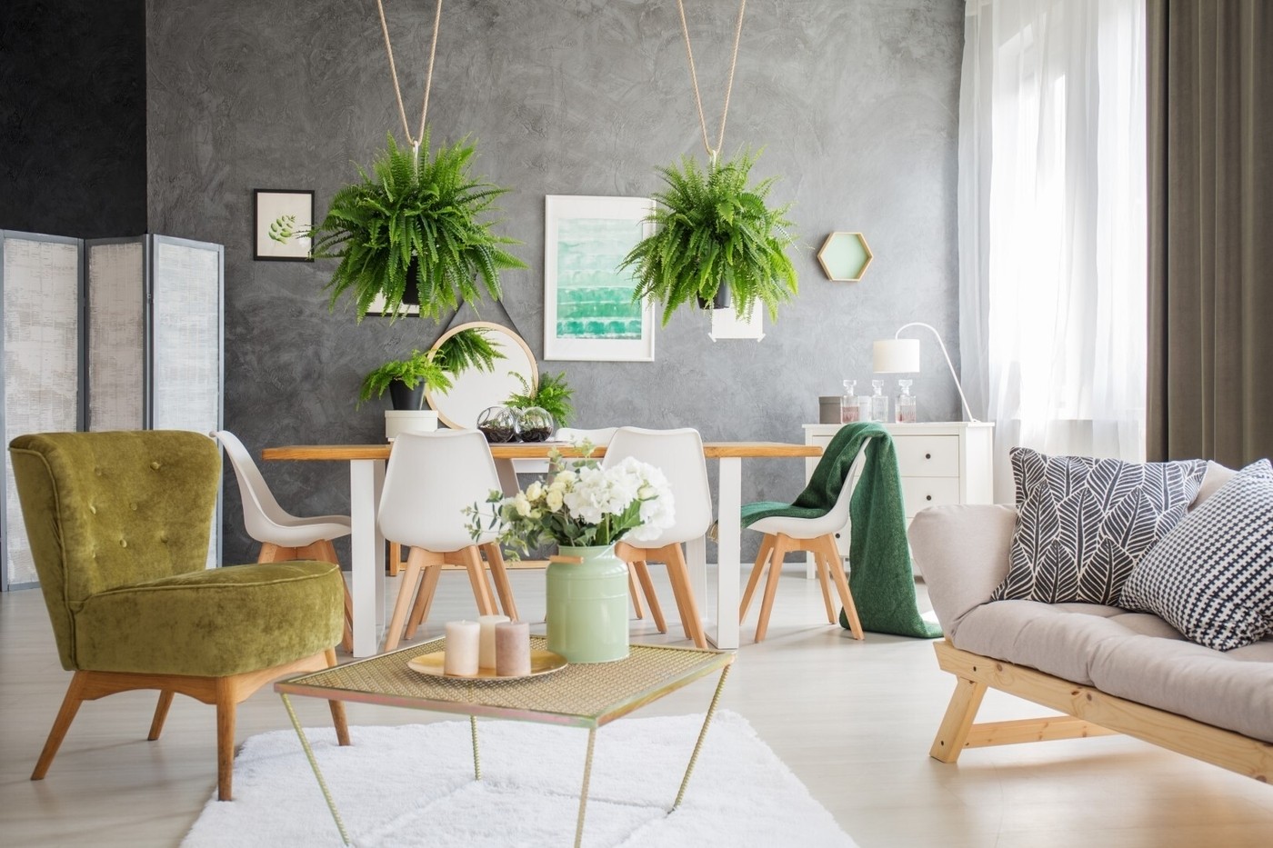 Green chair and grey sofa