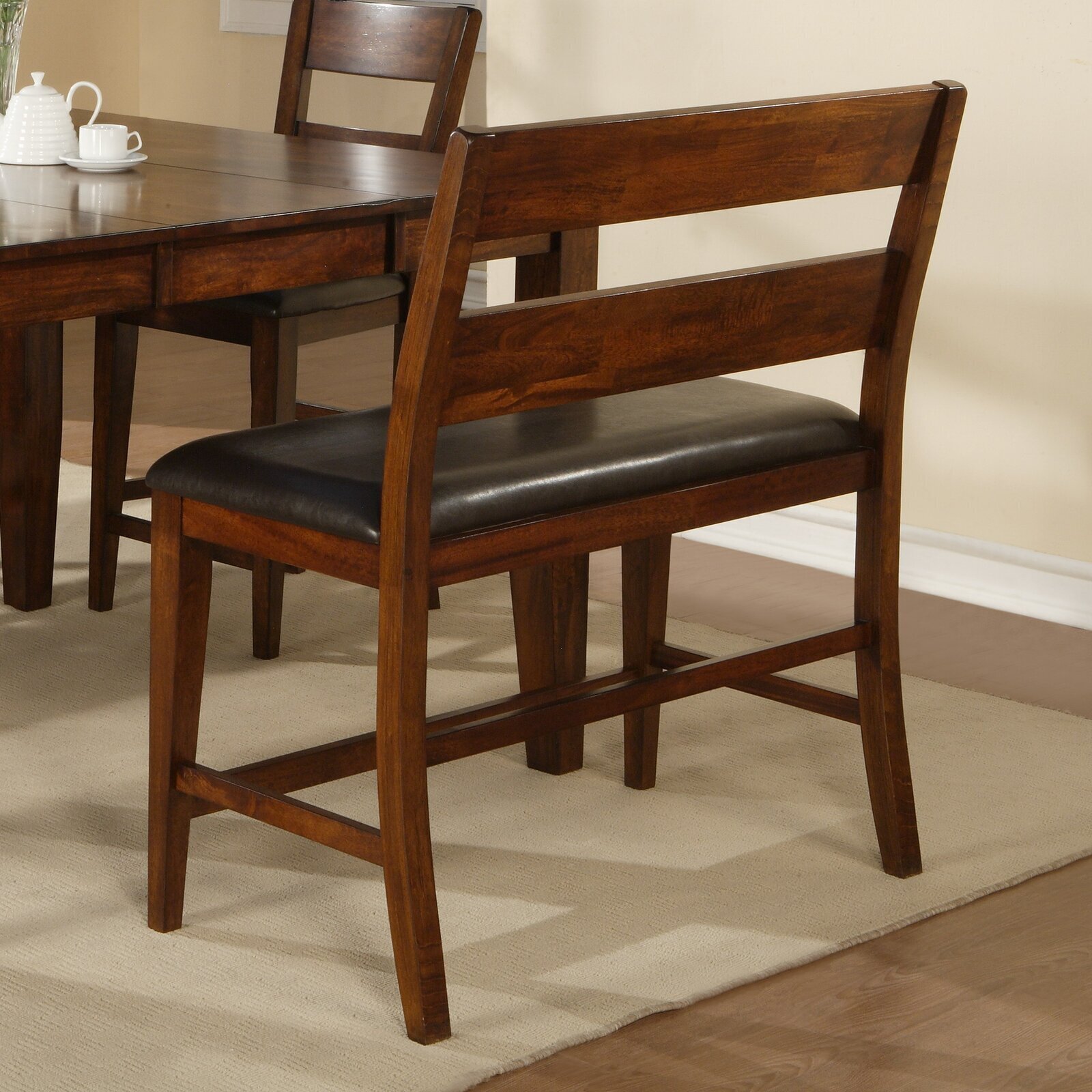 High back bench dining in a dark finish