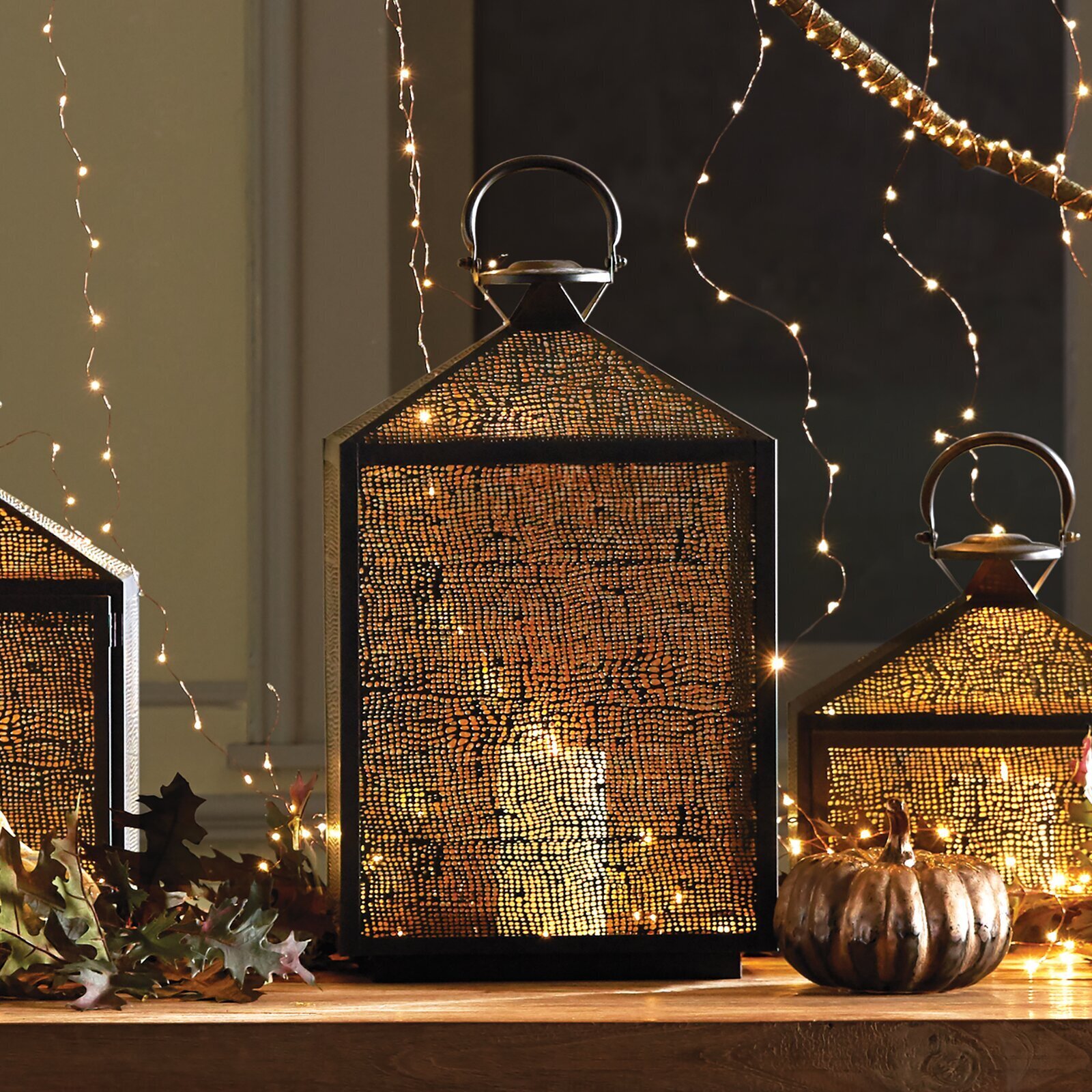 Lantern style floor candle holder