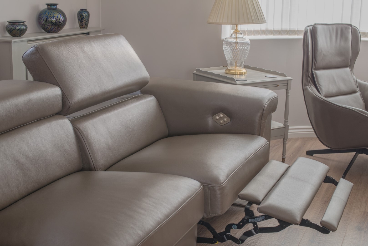 Leather sofa recliner