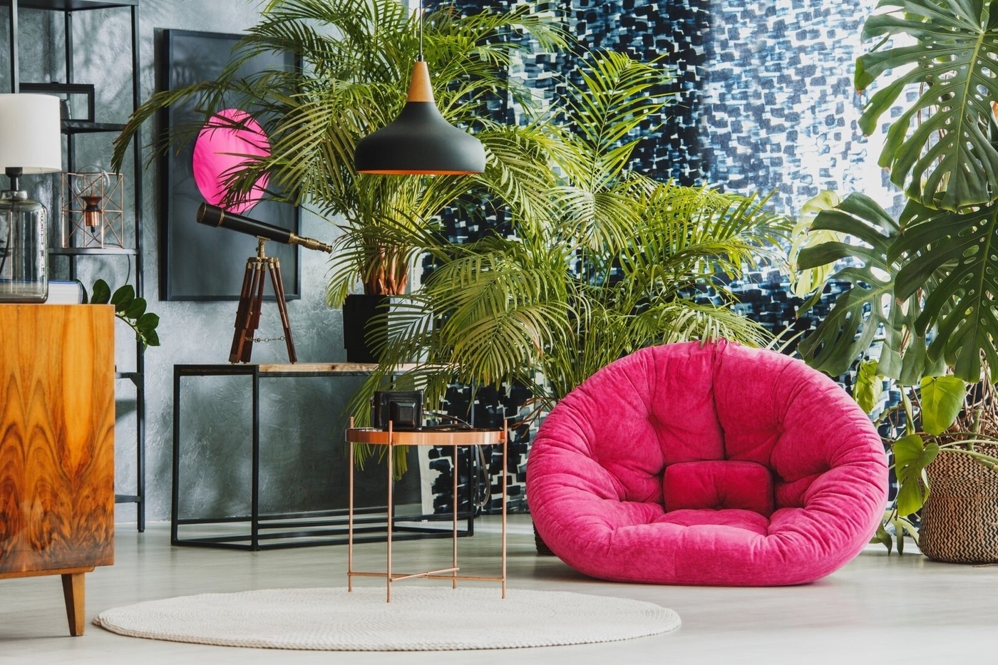 Living room with a pink plush armchair