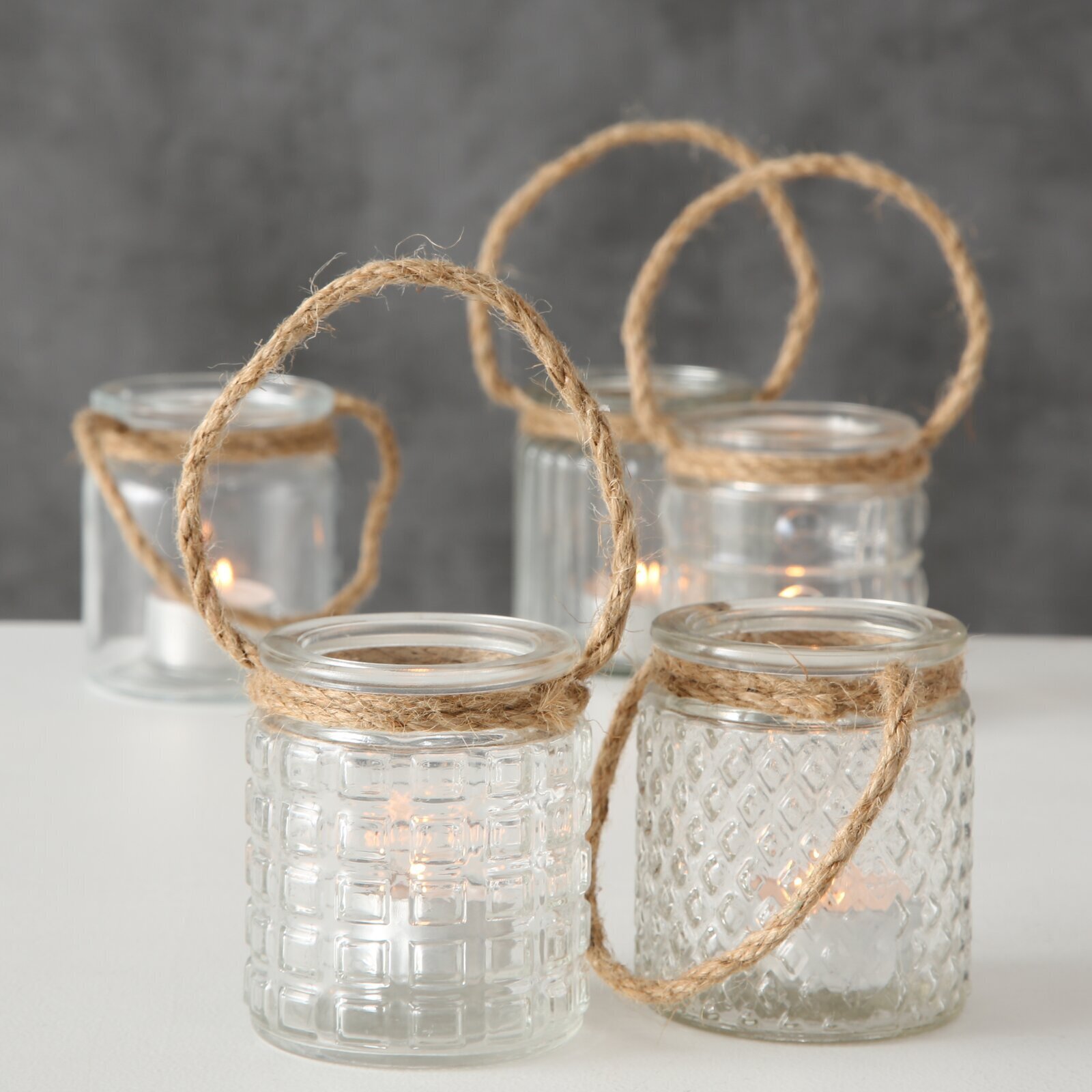 Set of five hurricane lamps