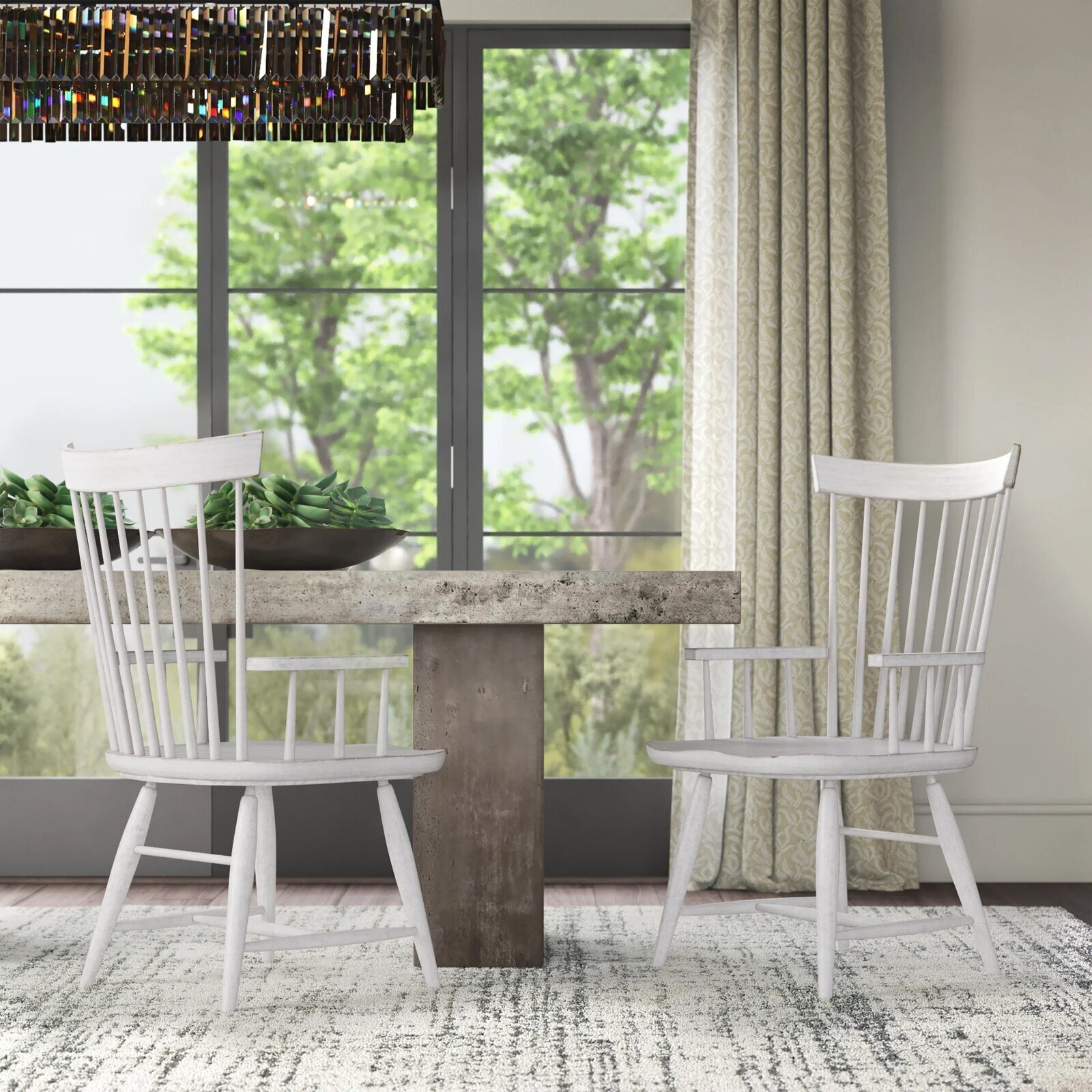 Set of spindle back dining chairs with arms