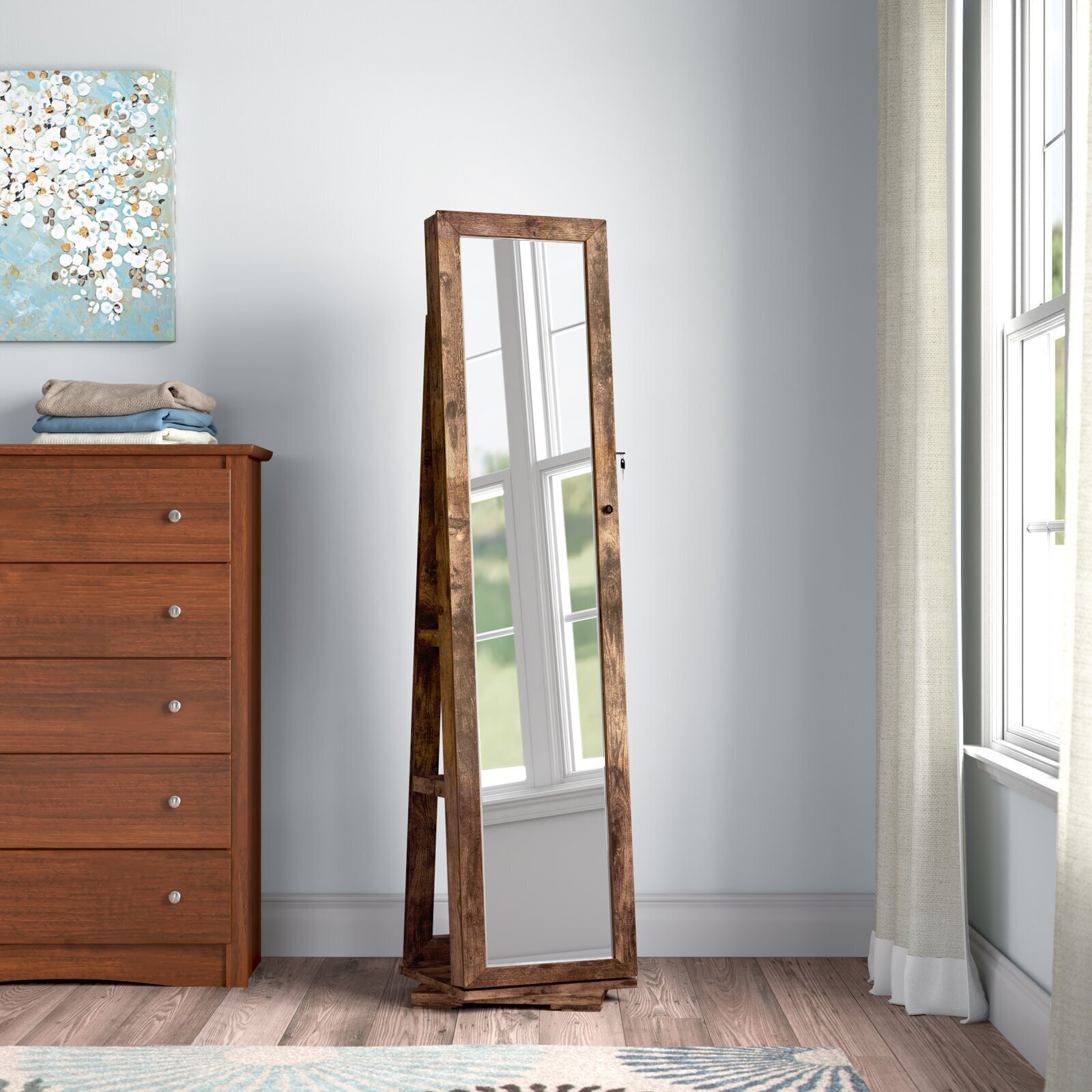 Sophisticated standing jewelry armoire with mirror