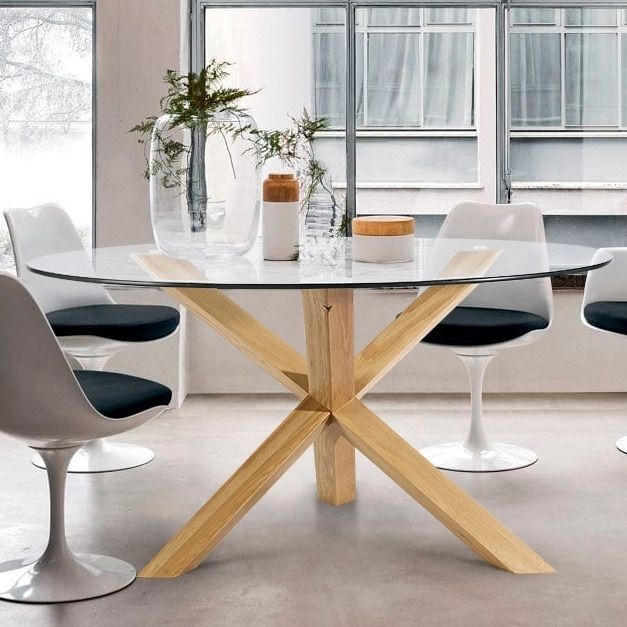 Three legged Glass Oval Dining Table with Star inspired Base