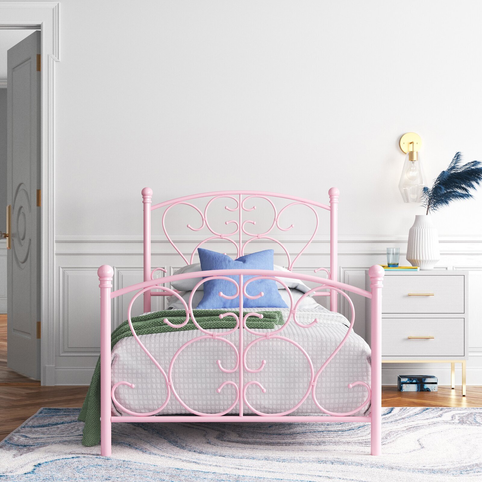 Vintage toddler bed with scrollwork details 