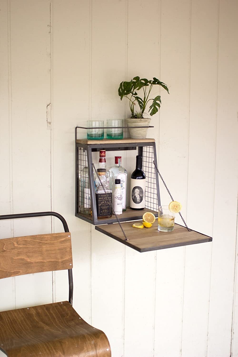 Wall mounted bar cabinet with fold down shelf