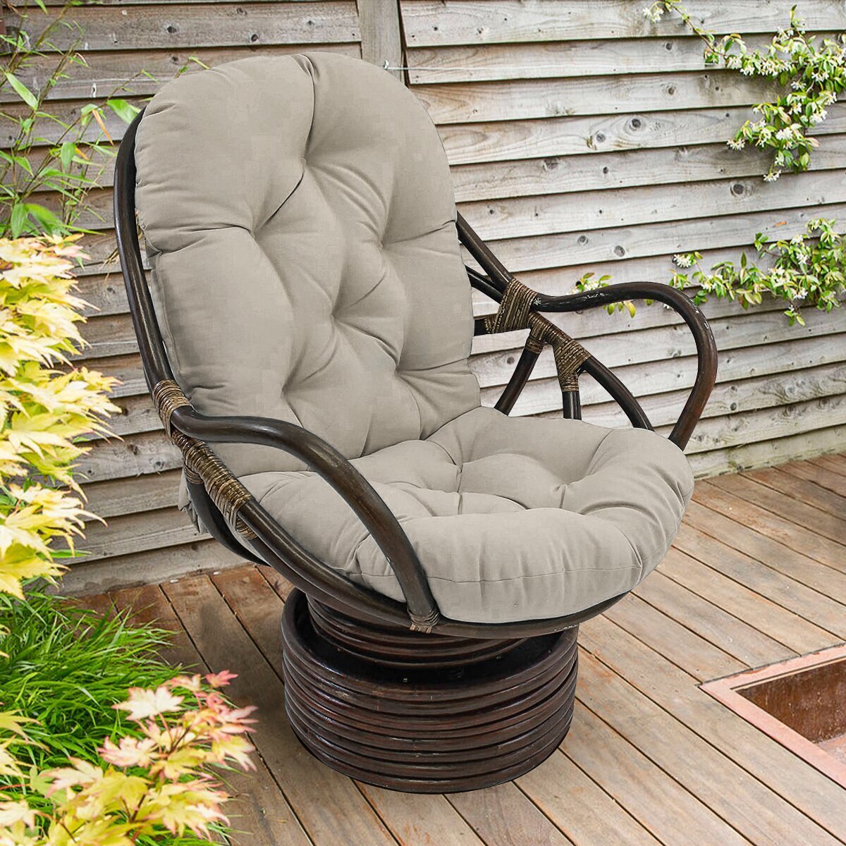 Understated Rattan Swivel Rocker Cushion