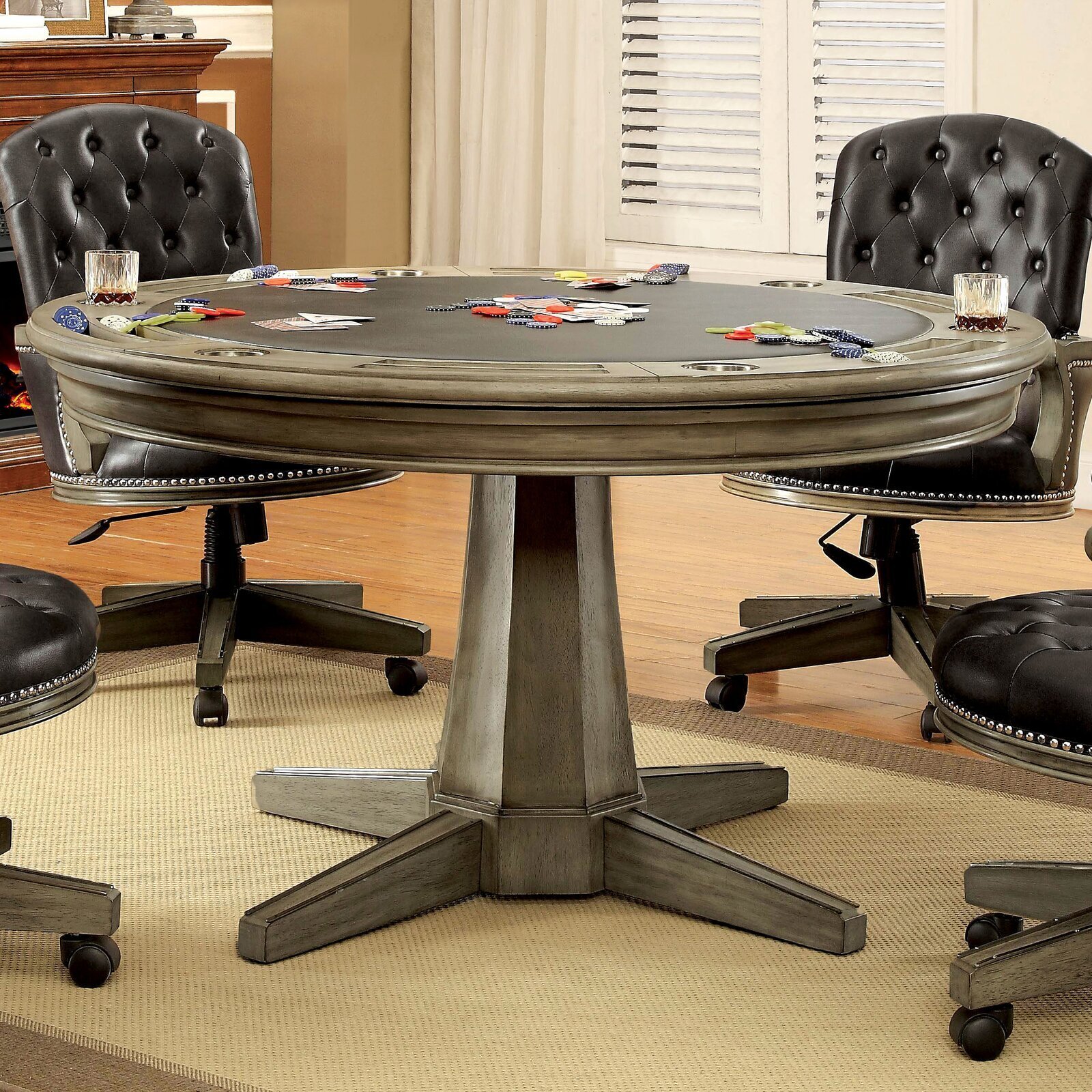 Gray, Slightly Distressed Table With Quilted Leather Chairs 